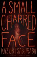 A_small_charred_face
